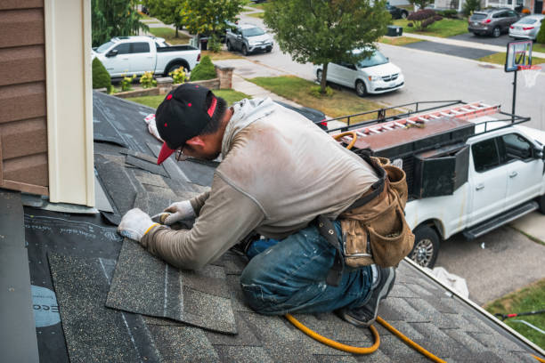 Professional Flat Roof Repair technician working in Cameron, TX